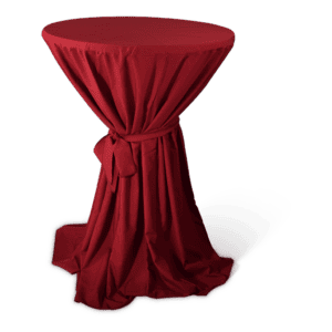 Tafeltje met rode tafelkleed en overtrek voor feestelijke gelegenheden.